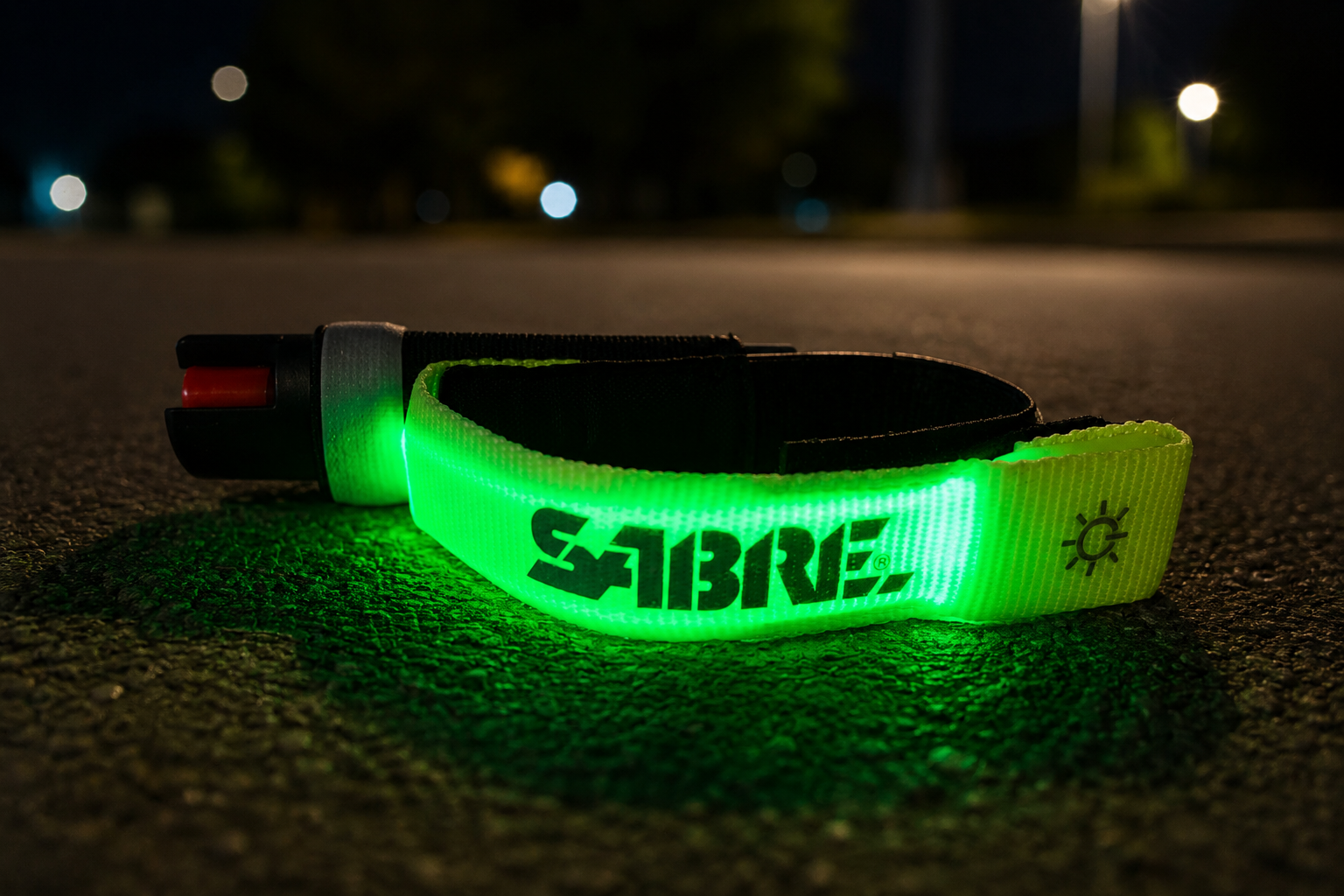 SABRE Runner Pepper Gel LED strap glowing green during a night run